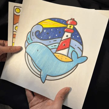 A colored whale with a lighthouse