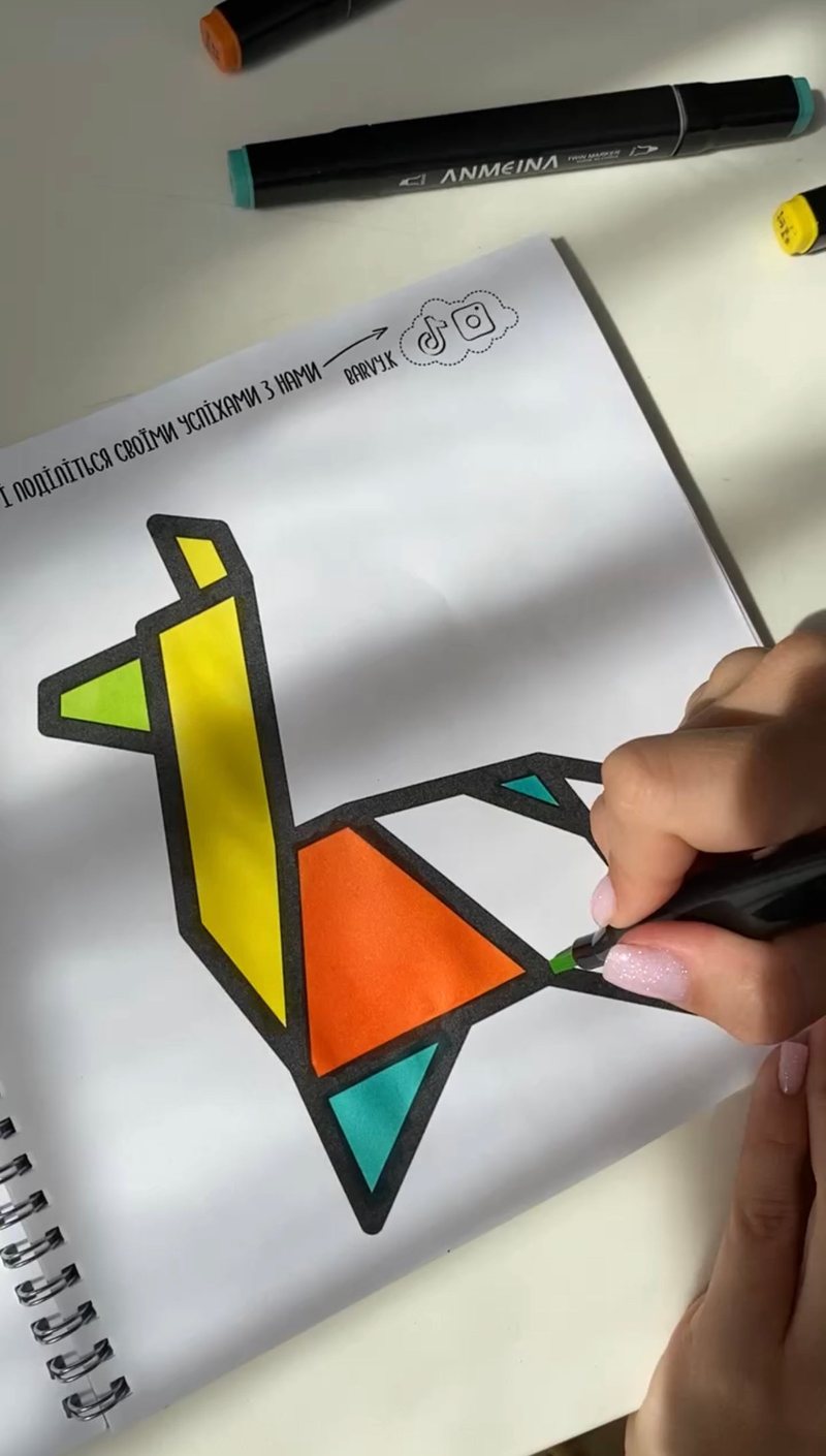 Coloring a little llama with markers